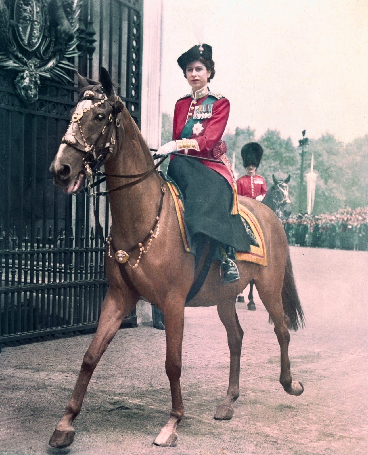 Princess Elizabeth represents the King at colorful trooping ceremony.