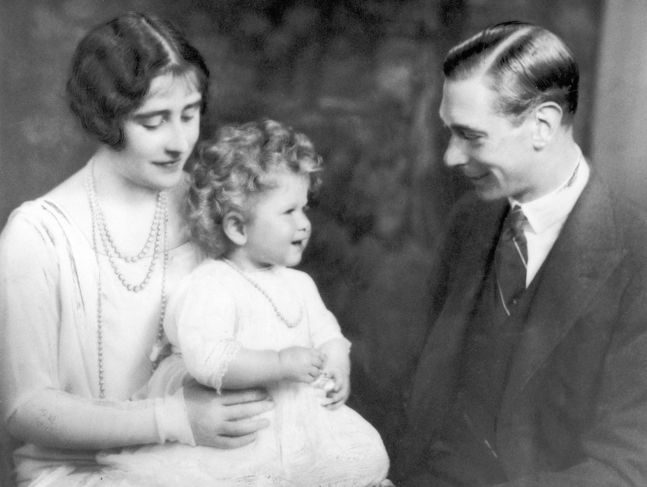 The Duke and Duchess of York with Princess Elizabeth in 1928.