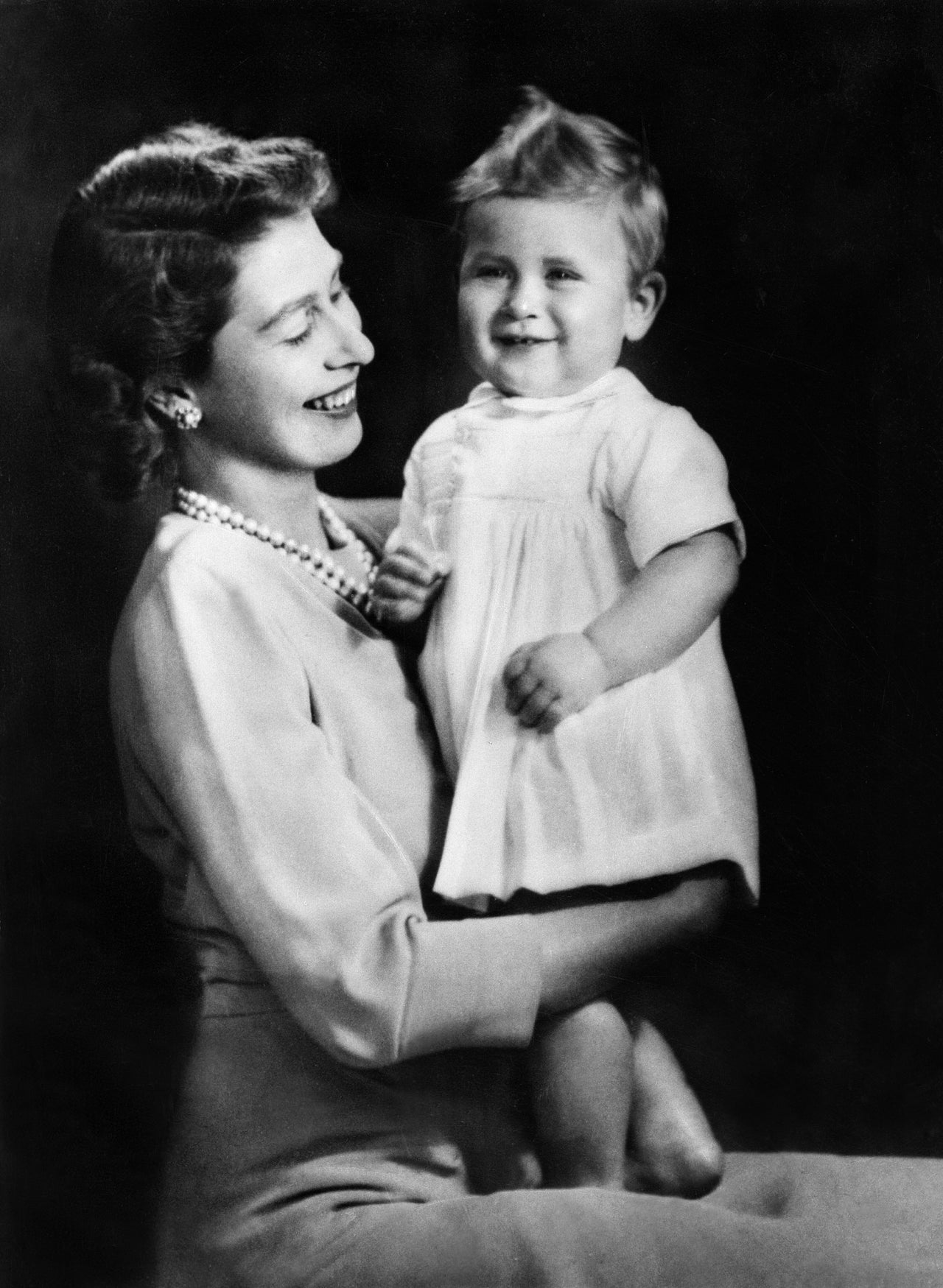 Queen Elizabeth II with her son Prince Charles.