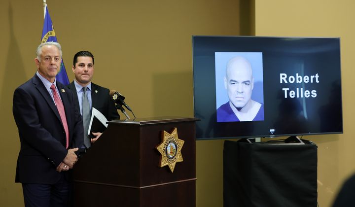 Clark County Sheriff Joe Lombardo (left) and Las Vegas Metropolitan Police Capt. Dori Koren take questions at a news conference on the arrest of Clark County Public Administrator Robert Telles, whose booking photo is displayed on a monitor. Telles is accused of fatally stabbing Las Vegas Review-Journal investigative reporter Jeff German.
