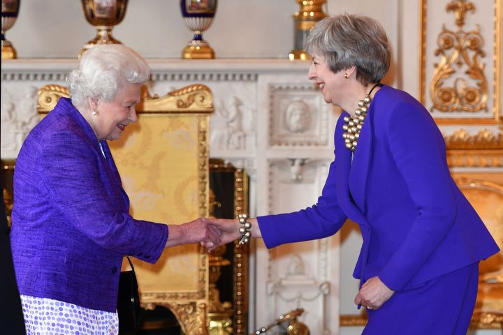 Britain's Queen Elizabeth II with former prime minister Theresa May at Buckingham Palace in London in March 2019. 