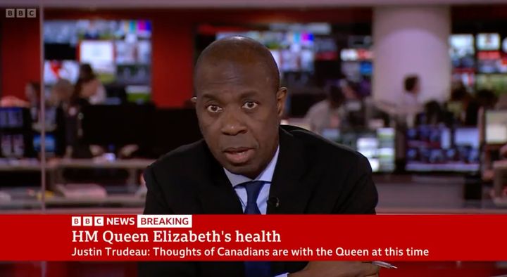 Clive Myrie presenting news coverage on Thursday