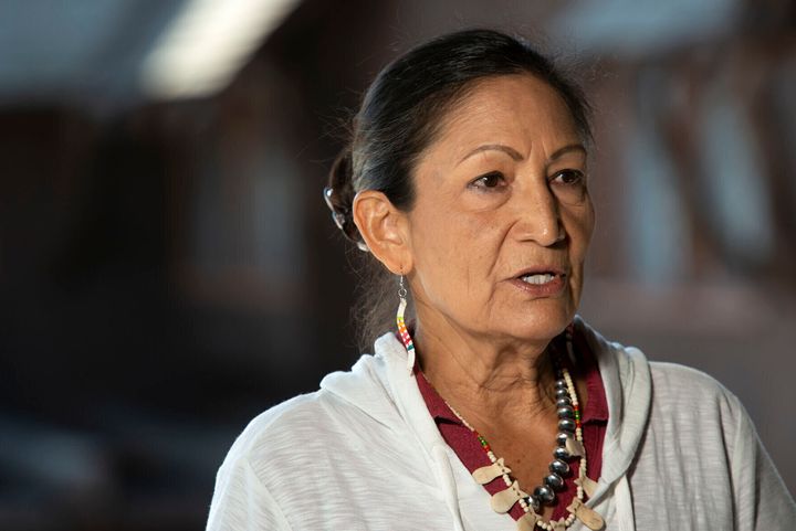 Secretary of the Interior Deb Haaland speaks at a news conference in Yellowstone National Park on Friday, July 8, 2022. The U.S. government has joined a ski resort and others that have quit using a racist term for a Native American woman by renaming hundreds of peaks, lakes, streams and other geographical features on federal lands in the West and elsewhere. 