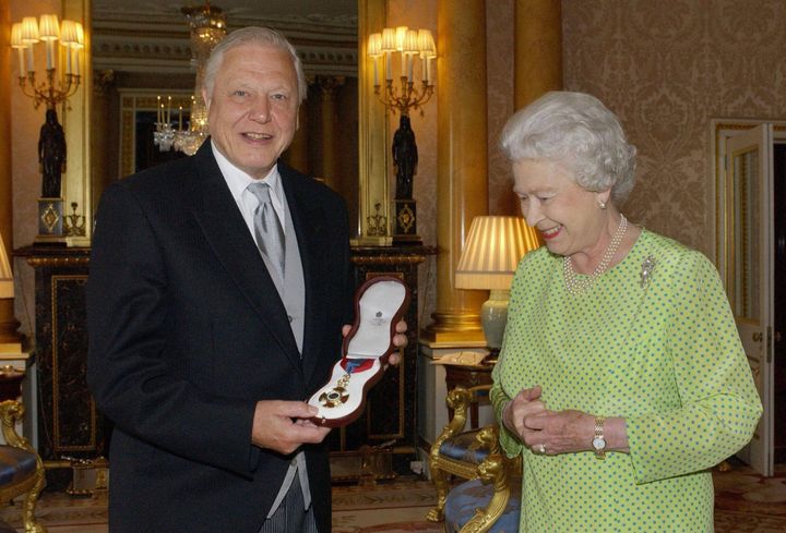 Sir David Attenborough with the Insignia of the Order of Merit, a personal award from the Queen recognising exceptional achievements in the advancement of arts, learning, literature and science at Buckingham Palace in 2005