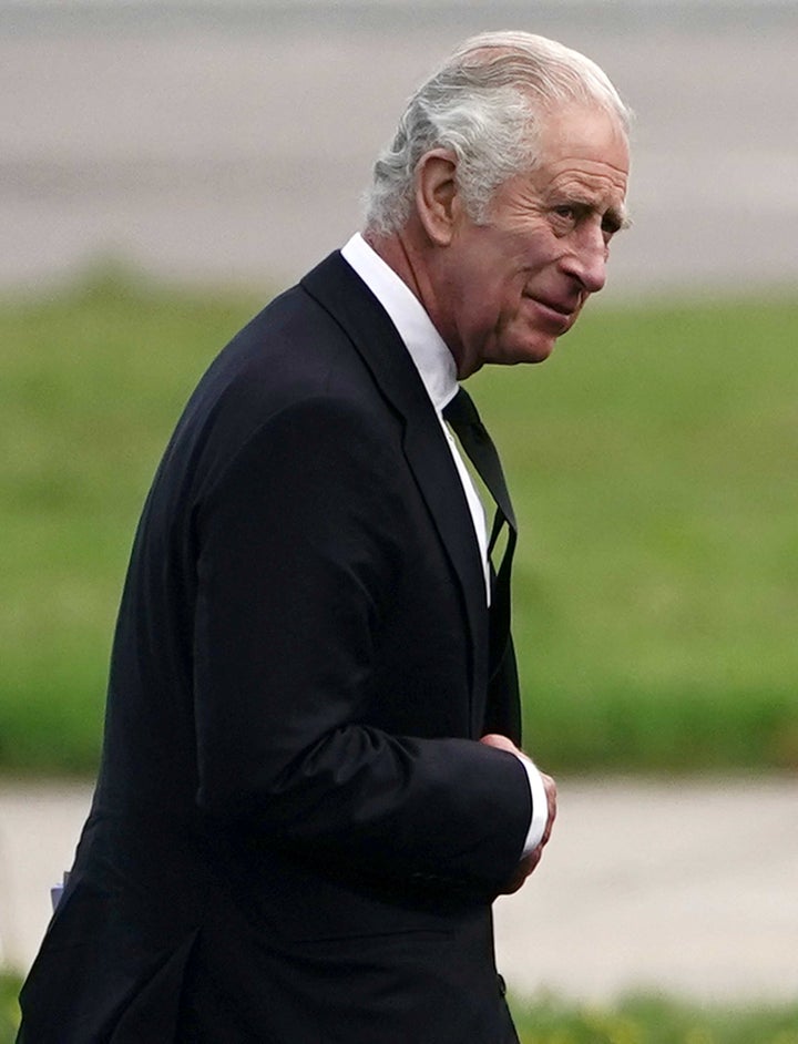 Britain's King Charles walks at Aberdeen Airport as he travels to London, following the death of Queen Elizabeth, in Aberdeen, Scotland, Britain September 9, 2022. Aaron Chown/Pool via REUTERS