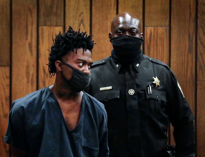 Ezekeil Kelly, left, makes his first court appearance on Friday, Sept. 9, 2022 in Memphis, Tenn. Kelly is accused of killing four people and wounding three others in a livestreamed shooting rampage. (Mark Weber/Daily Memphian via AP)