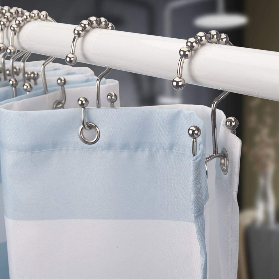 A set of 12 double-sided shower curtain rings