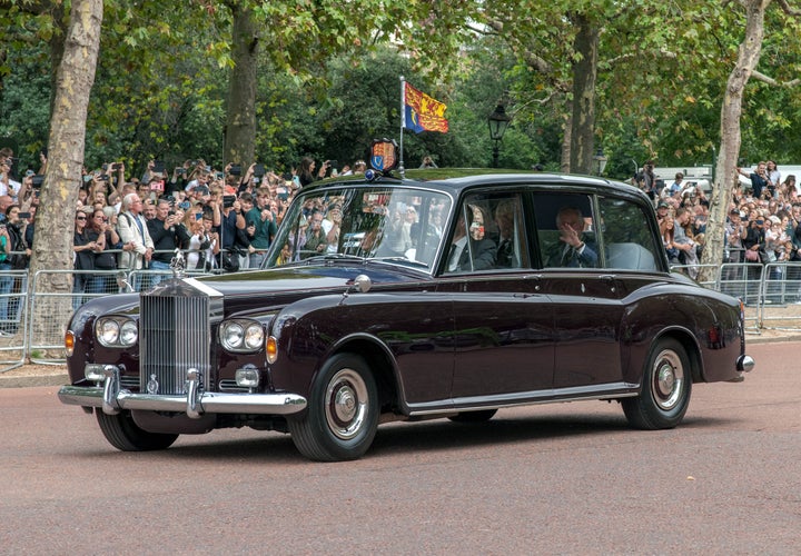 Carlos III en el palacio de Buckingham.