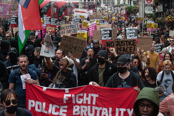 Protesters' signs included messages like "fight police brutality" and "Black Lives Matter"