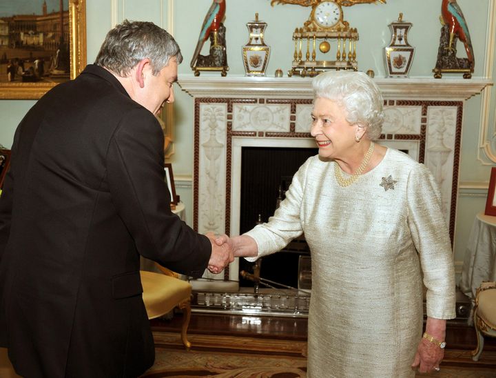 Queen Elizabeth II greeting Gordon Brown at Buckingham Palace.