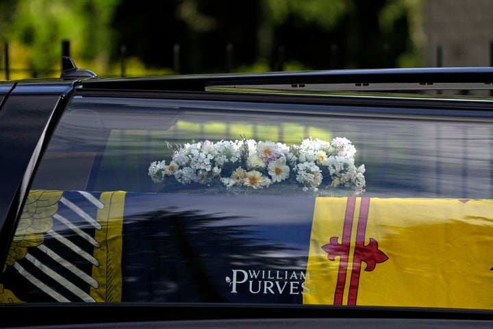 The coffin containing the body of Britain's Queen Elizabeth II leaves Balmoral Castle in Scotland, Sunday, Sept. 11, 2022. (AP Photo/Alastair Grant)