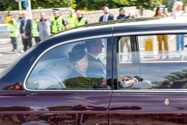 The Princess Royal and her husband Admiral Sir Tim Laurence travel behind the hearse carrying the coffin of Queen Elizabeth II.