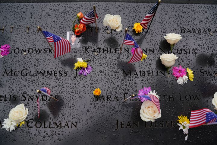 Families of the victims of the September 11 attacks circle the North Tower pool at the 9/11 Memorial & Museum in New York City, United States on the 21th anniversary of the attacks on September 11, 2022.