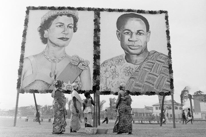 Huge portraits of Britain's Queen Elizabeth II and Ghana's President Kwame Nkrumah are displayed in Accra, Nov. 9, 1961, as the city prepares for the arrival of the British monarch on a state visit to Ghana. The queen and her husband, Prince Philip, Duke of Edinburgh, arrived in Accra by plane from London later that that day. (AP Photo, File)