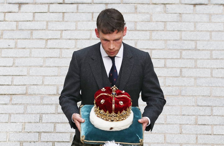 The Duke of Hamilton carrying the Crown of Scotland into the Scottish Parliament in Edinburgh ahead of a speech by the Queen in 2019