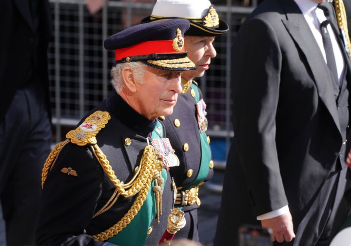 King Charles III and the Princess Royal walk behind Queen Elizabeth II's coffin during the procession from the Palace of Holyroodhouse to St Giles' Cathedral, Edinburgh. Picture date: Monday September 12, 2022.