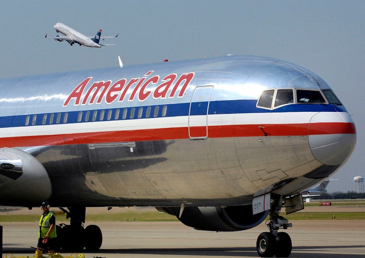 Kelly Pichardo and another first-class passenger were accused of assaulting an American Airlines passenger during their flight and using racial slurs when a male passenger asked them to stop.