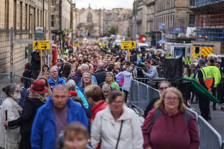 People queue to view the late Queen Elizabeth II's coffin at St Giles Cathedral in Edinburgh, Scotland.