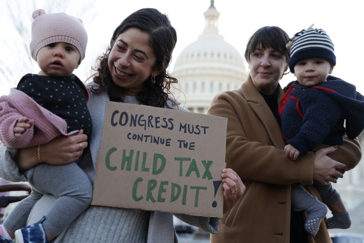 Parents joined a rally in front of the U.S. Capitol on Dec. 13, 2021, to urge Congress to extend the child tax credit.