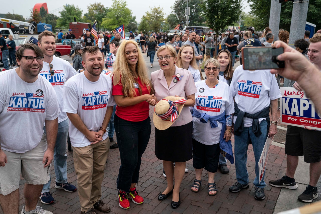 Kaptur poses for a photo with supporters before the parade.