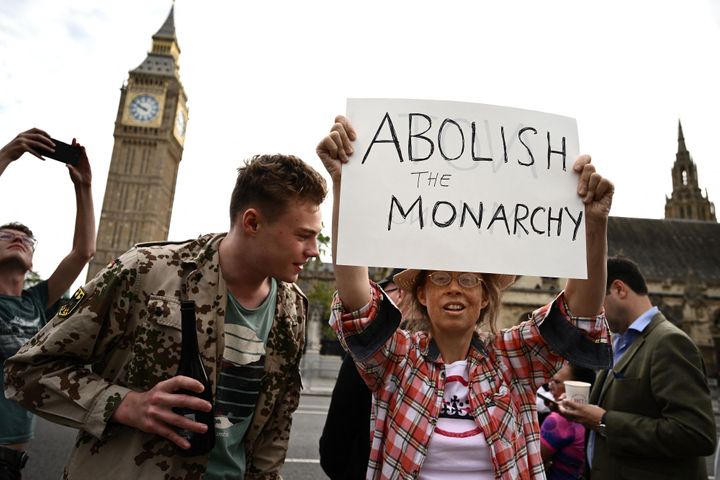 An anti-Royal demonstrator protests outside Palace of Westminster, central London on September 12, 2022, following the death of Queen Elizabeth II.