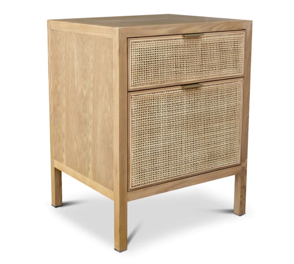 A natural wood cabinet with textured detailing