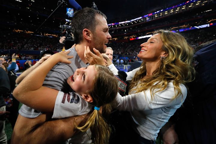 Brady celebrates with his wife Super Bowl LIII.