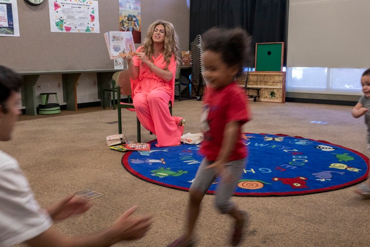 Drag queen "Pickle" reads to kids at the West Valley Regional Branch Library in Los Angeles in 2019.