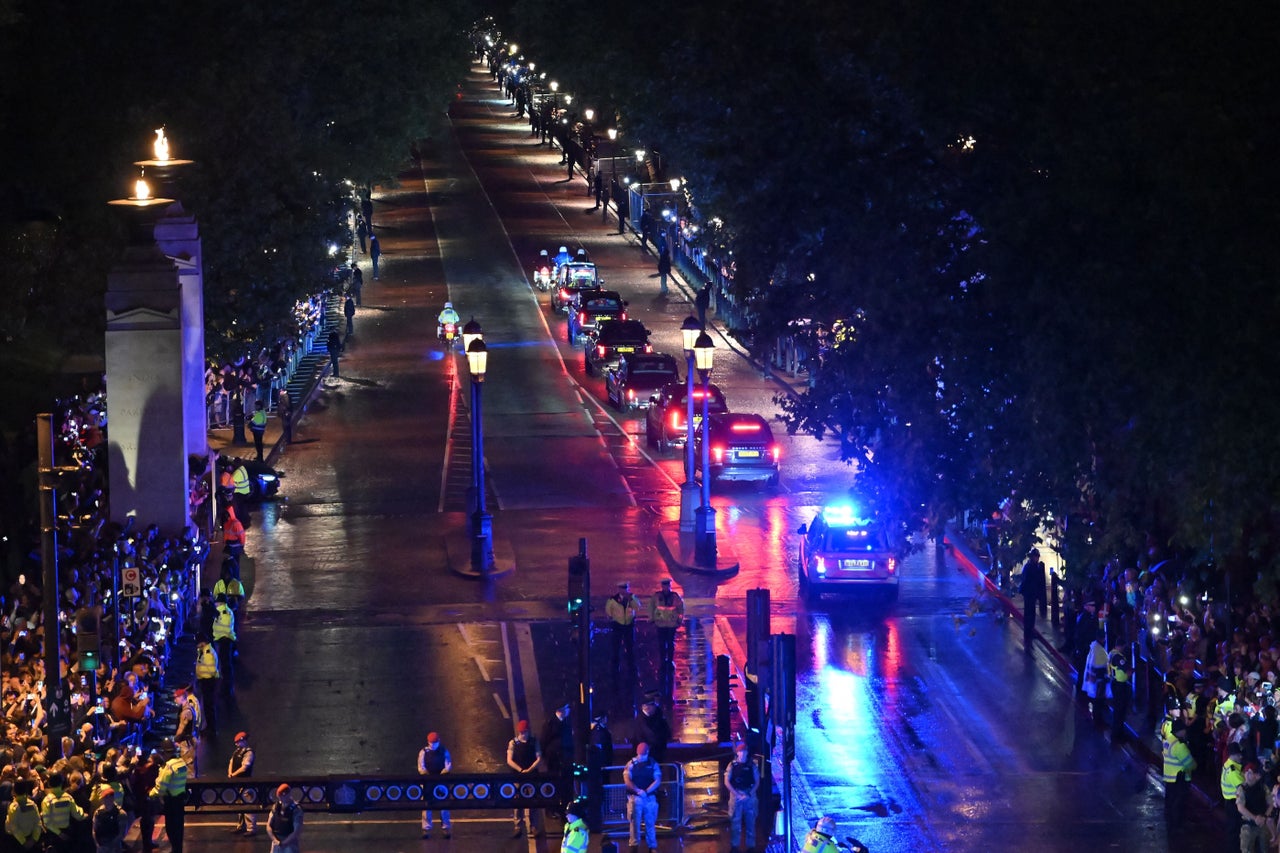 Seen from the top of the Wellington Arch, the coffin of Queen Elizabeth II is taken down Constitution Hill in the Royal Hearse to Buckingham Palace in London.