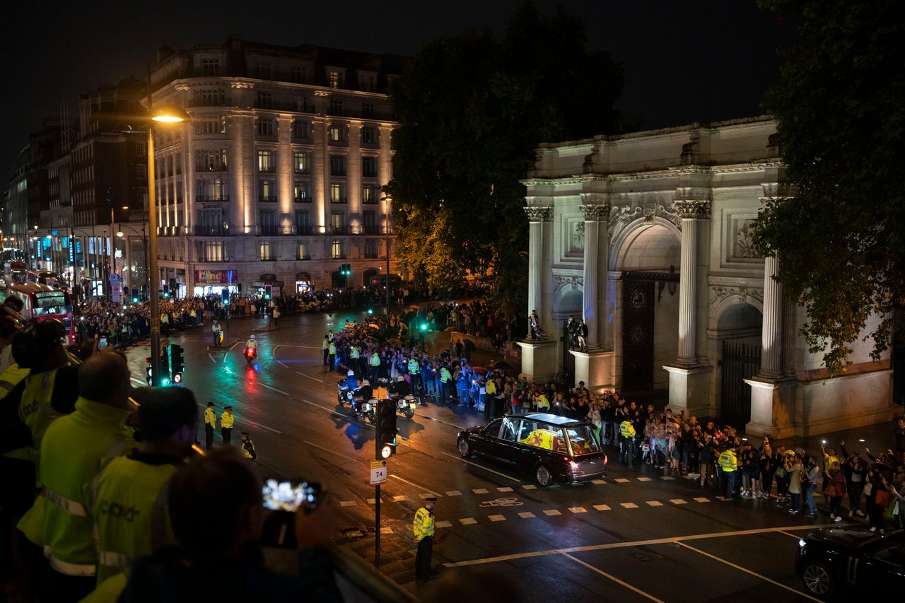 People gather near the Marble Arch.