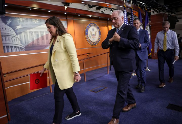 Rep. Elise Stefanik (R-N.Y.), left, and Rep Steve Scalise (R-La.), center, are seen after a press conference in June. Stefanik, the party conference chair, had been talked about as a candidate to succeed Scalise in the next higher slot of party whip, but she said Tuesday she will instead run to stay in her current leadership post.