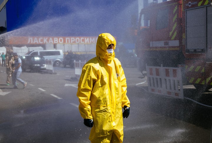 A Ukrainian Emergency Ministry rescuer attends a training exercise in the city of Zaporizhzhia on Aug. 17 to be prepared in case of a possible nuclear incident at the Zaporizhzhia nuclear power plant. Ukraine remains deeply scarred by the 1986 Chernobyl nuclear catastrophe.