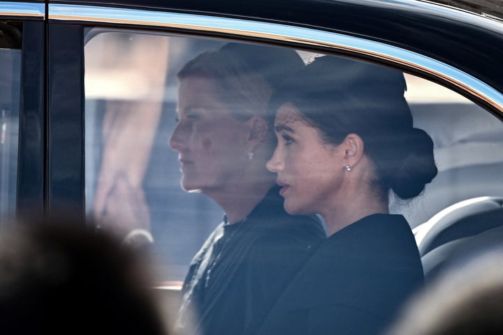 Sophie, Countess of Wessex and Meghan, Duchess of Sussex are driven behind the coffin of Queen Elizabeth II.