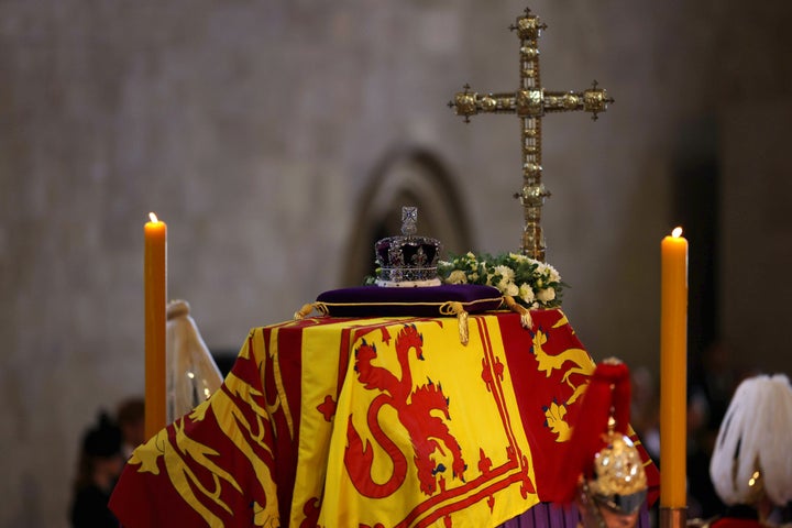 The Imperial State Crown is seen on the coffin carrying Queen Elizabeth II inside the Palace of Westminster.