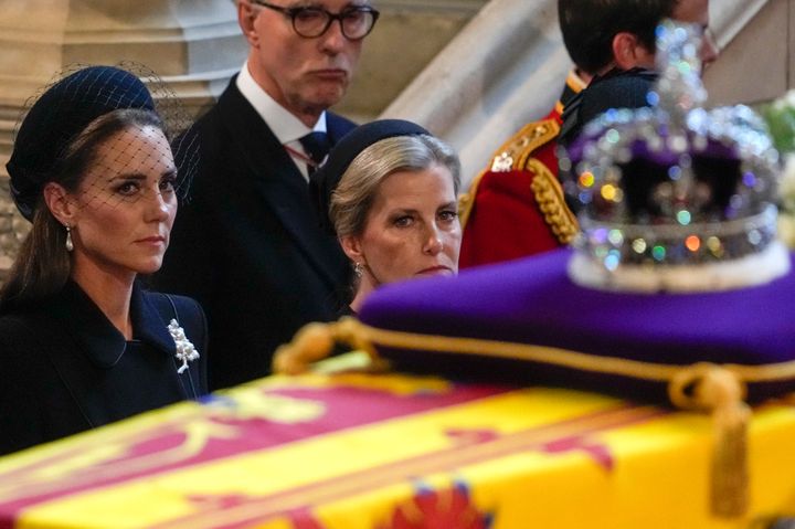 The Princess of Wales and Sophie, Countess of Wessex, watch the coffin of Queen Elizabeth arrive in Westminster Hall on Sep. 14.