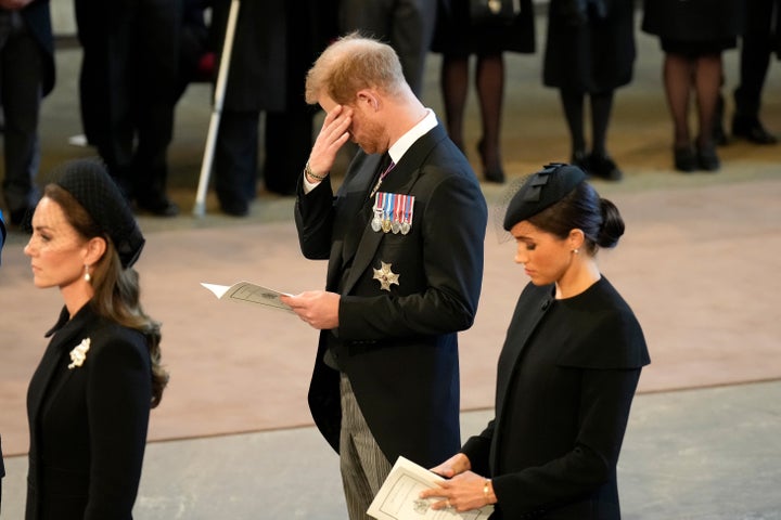 The Princess of Wales and the Duke and Duchess of Sussex pay their respects in The Palace of Westminster after the procession.