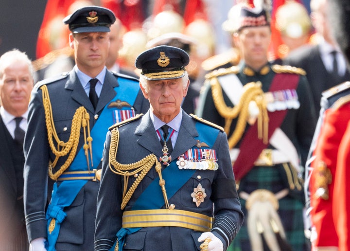 King Charles III and Prince William, Prince of Wales during the procession of the coffin of Britain's Queen Elizabeth.