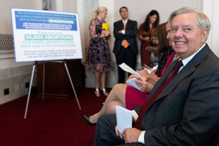 Sen. Lindsey Graham (R-S.C.) smiles before speaking during his news conference on Capitol Hill to announce a national bill on abortion restrictions on Tuesday.