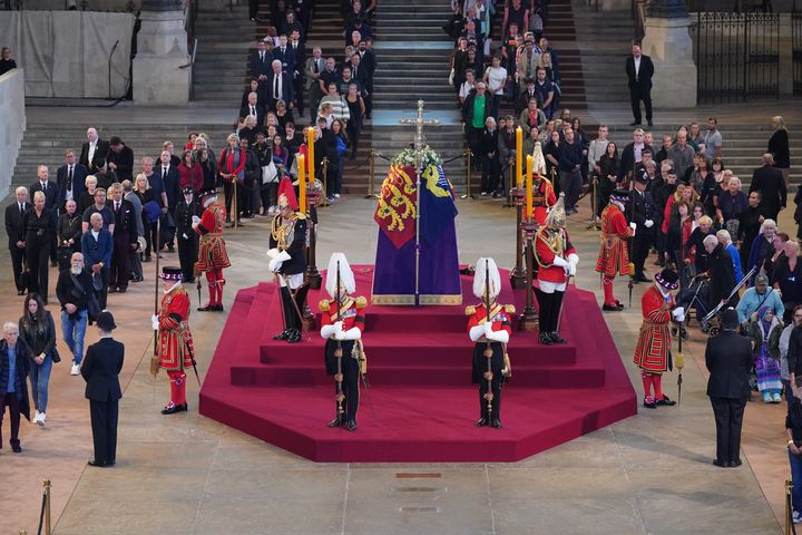 The first members of the public pay their respects as the vigil begins around the coffin of Queen Elizabeth II in Westminster Hall, London, where it will lie in state ahead of her funeral on Monday.