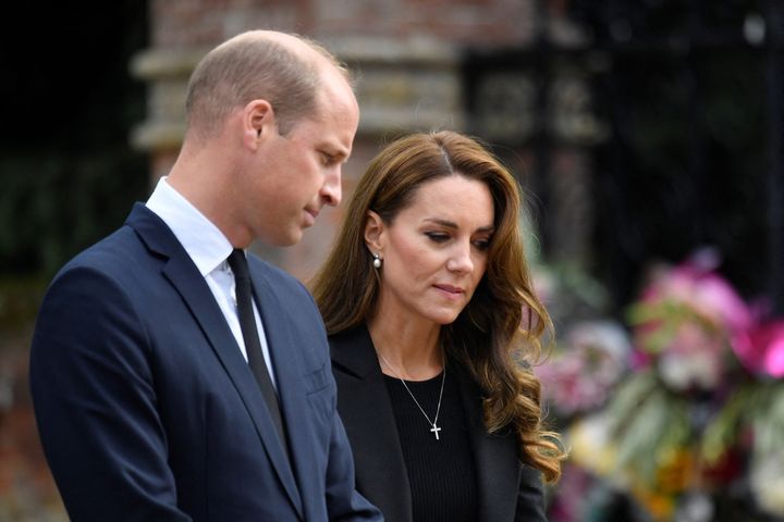 The Prince and Princess of Wales view floral tributes placed outside the Sandringham Estate on Sept. 15 following the death of Queen Elizabeth II.