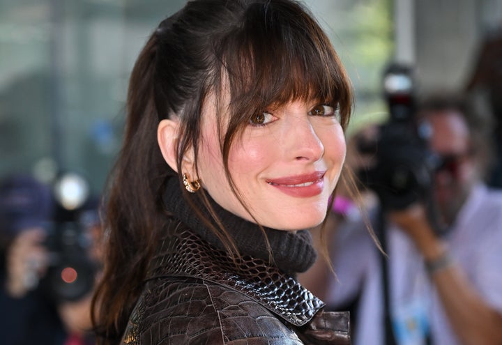 Anne Hathaway arrives to Michael Kors fashion show in New York City.