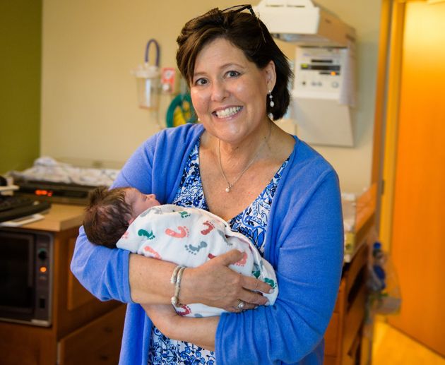 The author's mother holds the author's daughter a few minutes after she was born in August 2018. 