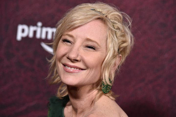 FILE - Anne Heche arrives at the premiere of "The Tender Bar" 2021.