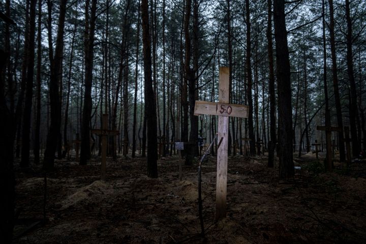 A mass grave of Ukrainian soldiers and unknown buried civilians was found in the forest of recently recaptured city of Izium. 