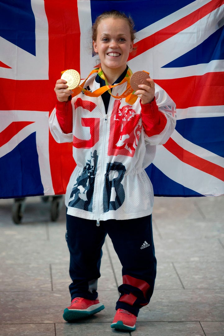 Ellie posing with her gold medals after her wins in Rio back in 2016