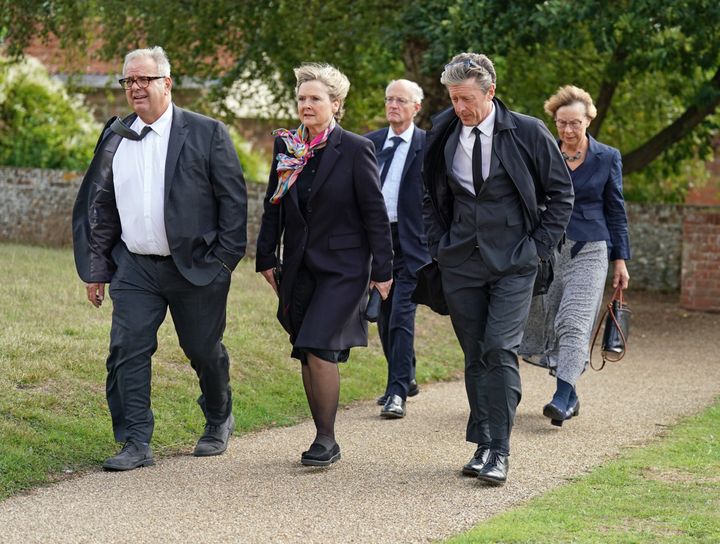 Mourners including Martha Kearney and Charlie Stayt are pictured arriving at his funeral