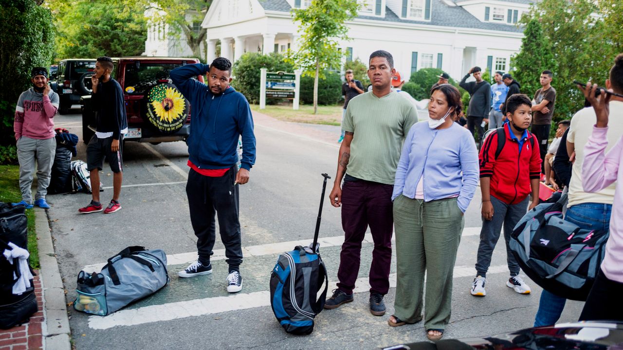 Immigrants gather with their belongings outside St. Andrews Episcopal Church, Wednesday Sept. 14, 2022, in Edgartown, Mass., on Martha's Vineyard. Florida Gov. Ron DeSantis on Wednesday flew two planes of immigrants to Martha's Vineyard, escalating a tactic by Republican governors to draw attention to what they consider to be the Biden administration's failed border policies. 
