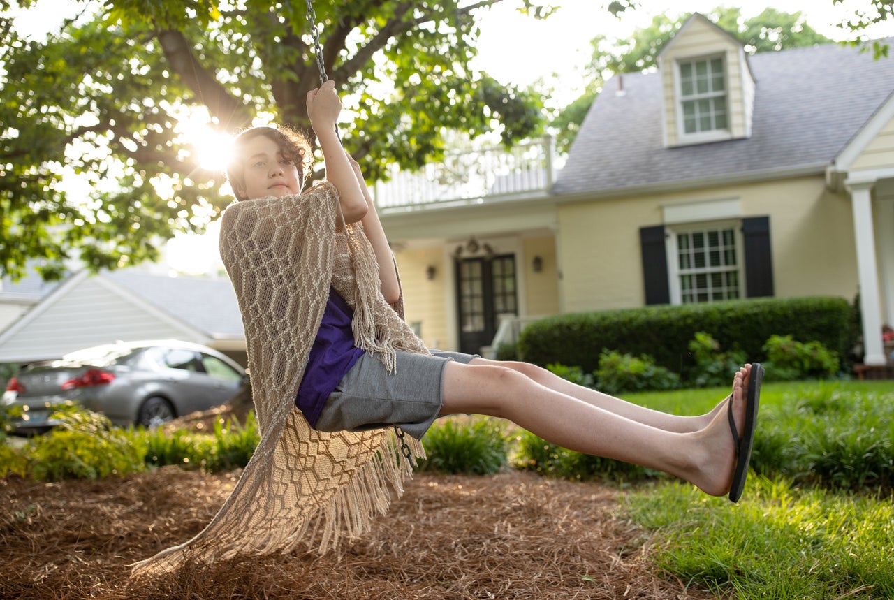 Fischer Wells, here on a neighborhood swing in Louisville, was apparently the only student affected by Kentucky's SB 83, which was enacted over the veto of the governor.