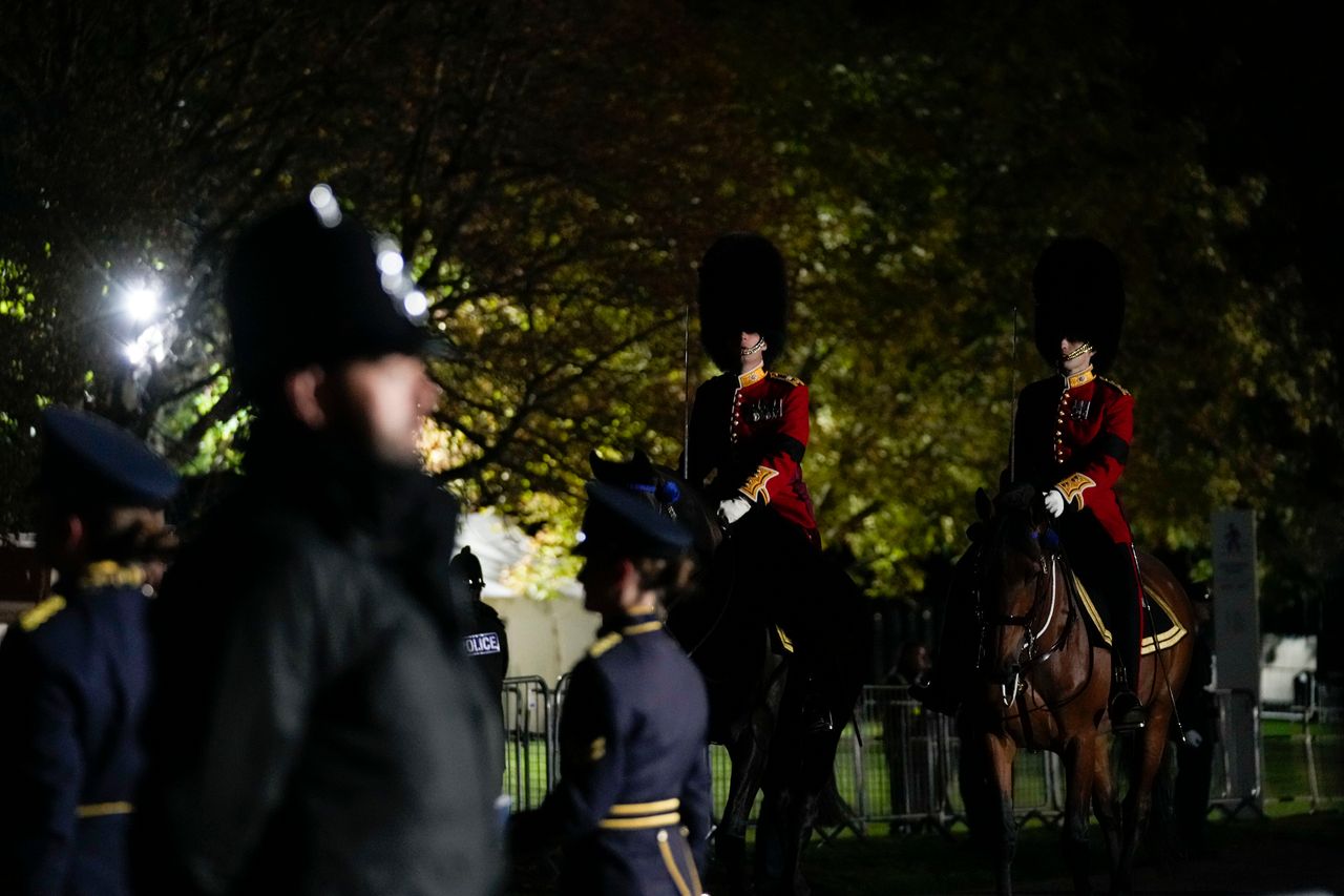 Royal guards take part in final drills along the Long Walk, as they prepare for the State Funeral of Queen Elizabeth lI, near Windsor Castle, England, Saturday, Sept. 17, 2022. The Queen will lie in state in Westminster Hall for four full days before her funeral on Monday Sept. 19. (AP Photo/Gregorio Borgia)