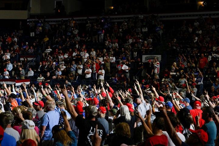 Donald Trump disciples raise a disturbing stiff-armed one-finger salute to the former president at his his Ohio rally last week.